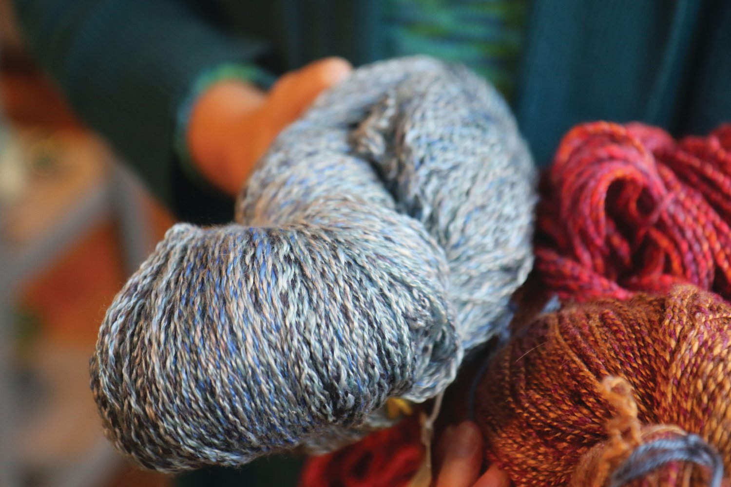 Bright skeins of yarn punctuate Fiber and Clay, where Lise Solvang and her partner potter Scot Olson play with texture and color.